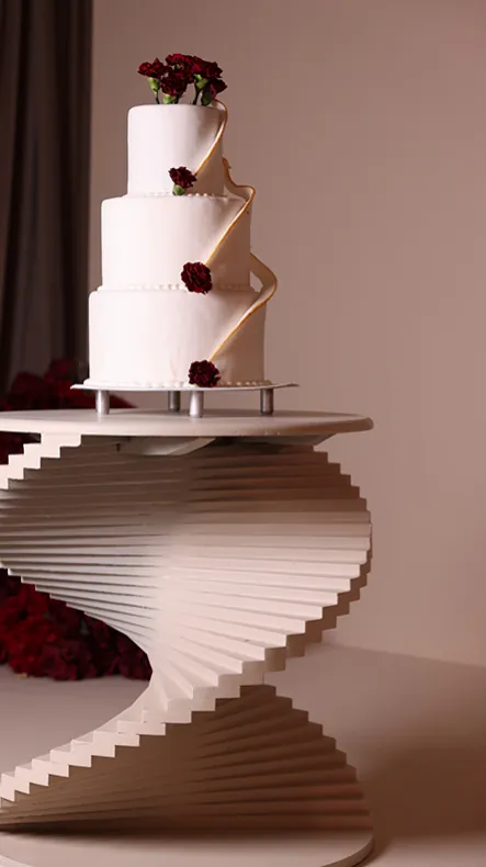 Wedding cake on a sculpted spiral stand